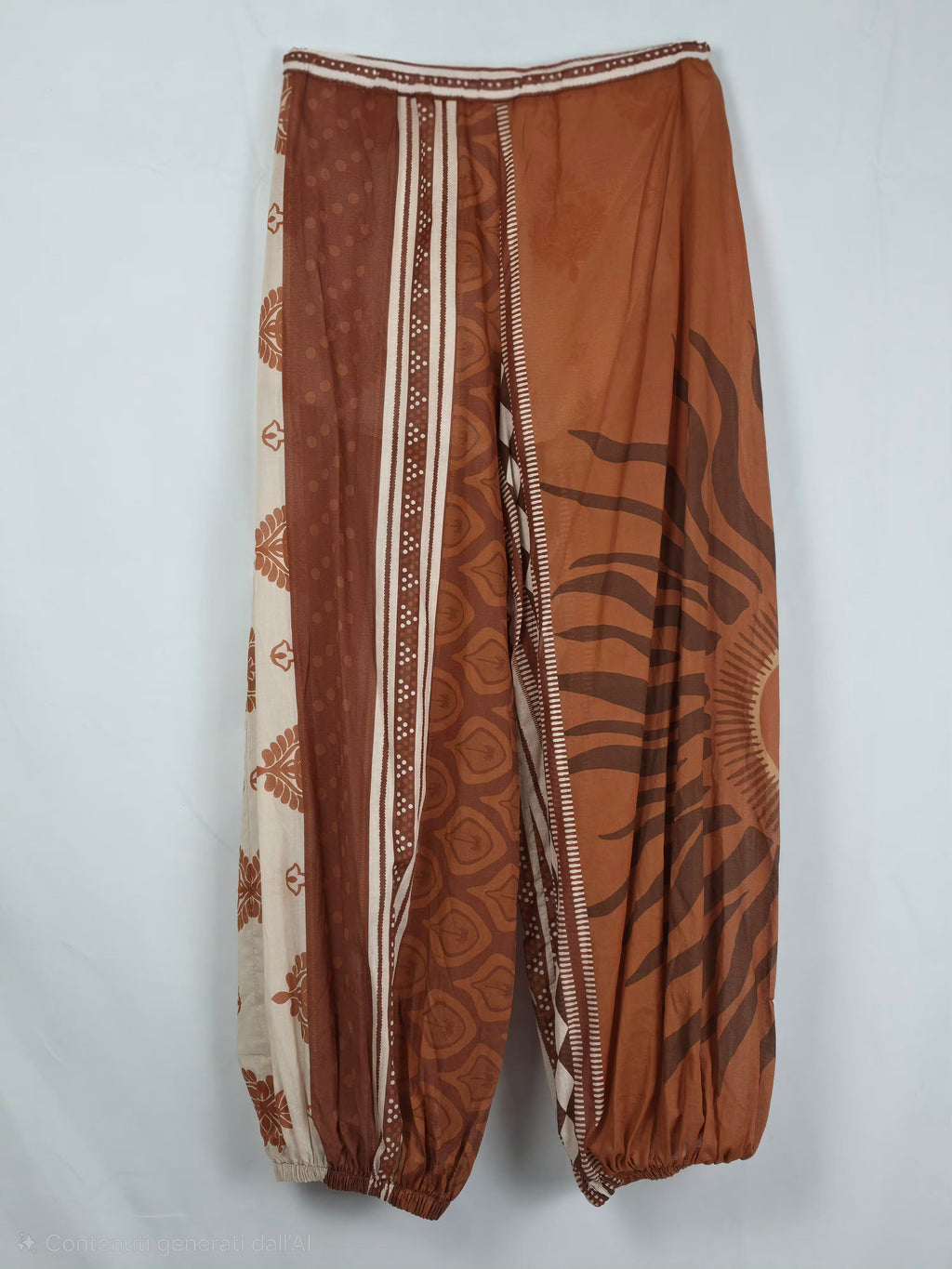 Pantaloni harem boho in cotone con fantasia etnica , stampa solare e motivi geometrici