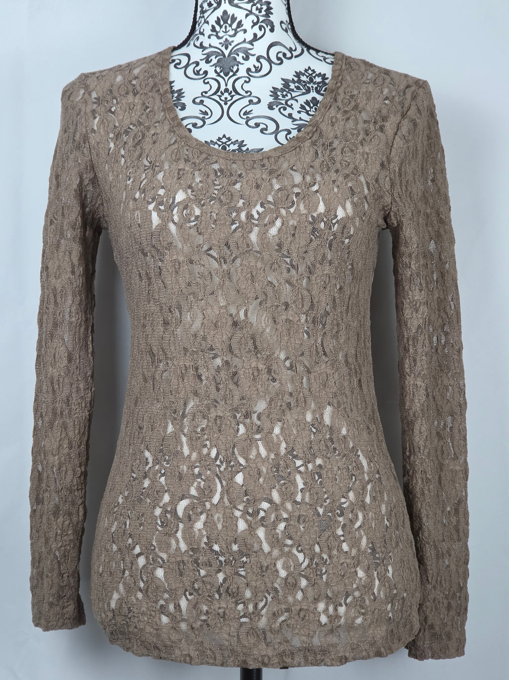 Maglia in pizzo traforato a maniche lunghe