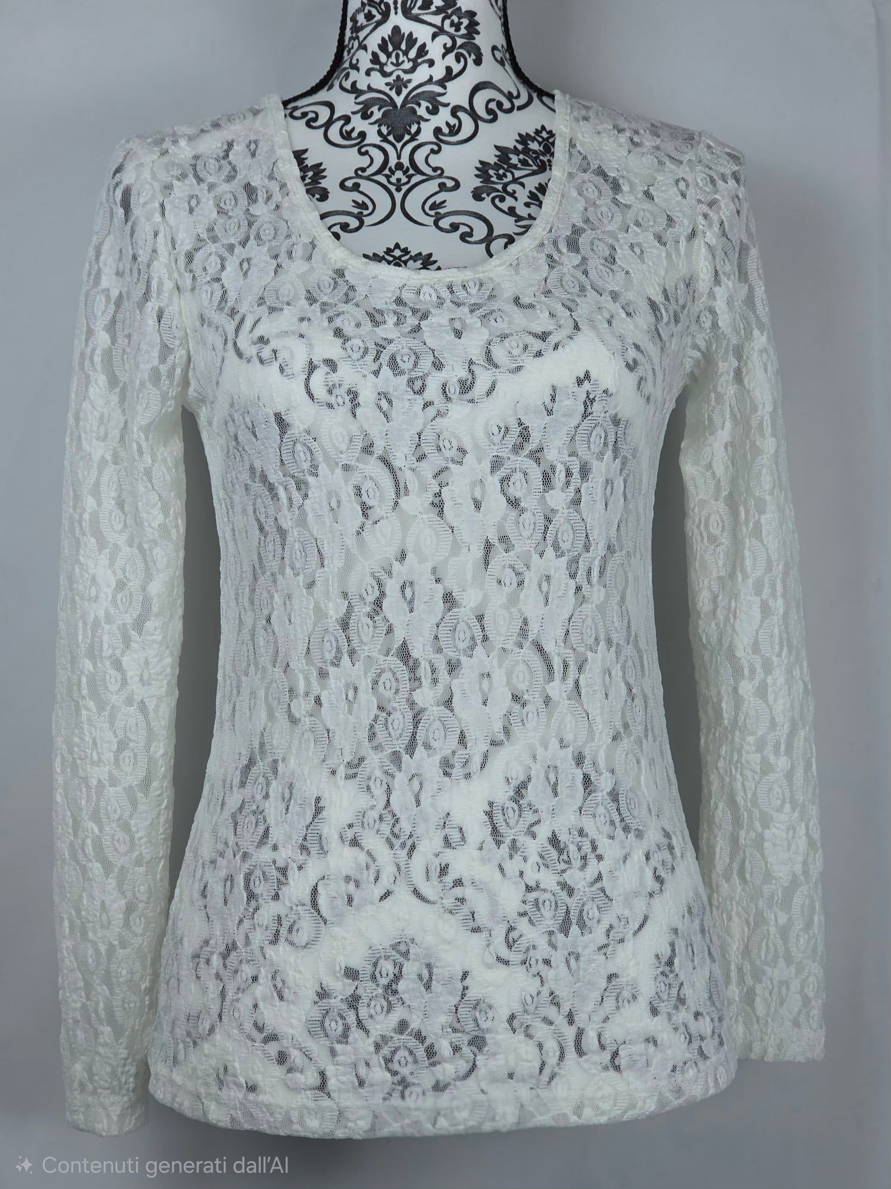 Maglia in pizzo traforato a maniche lunghe