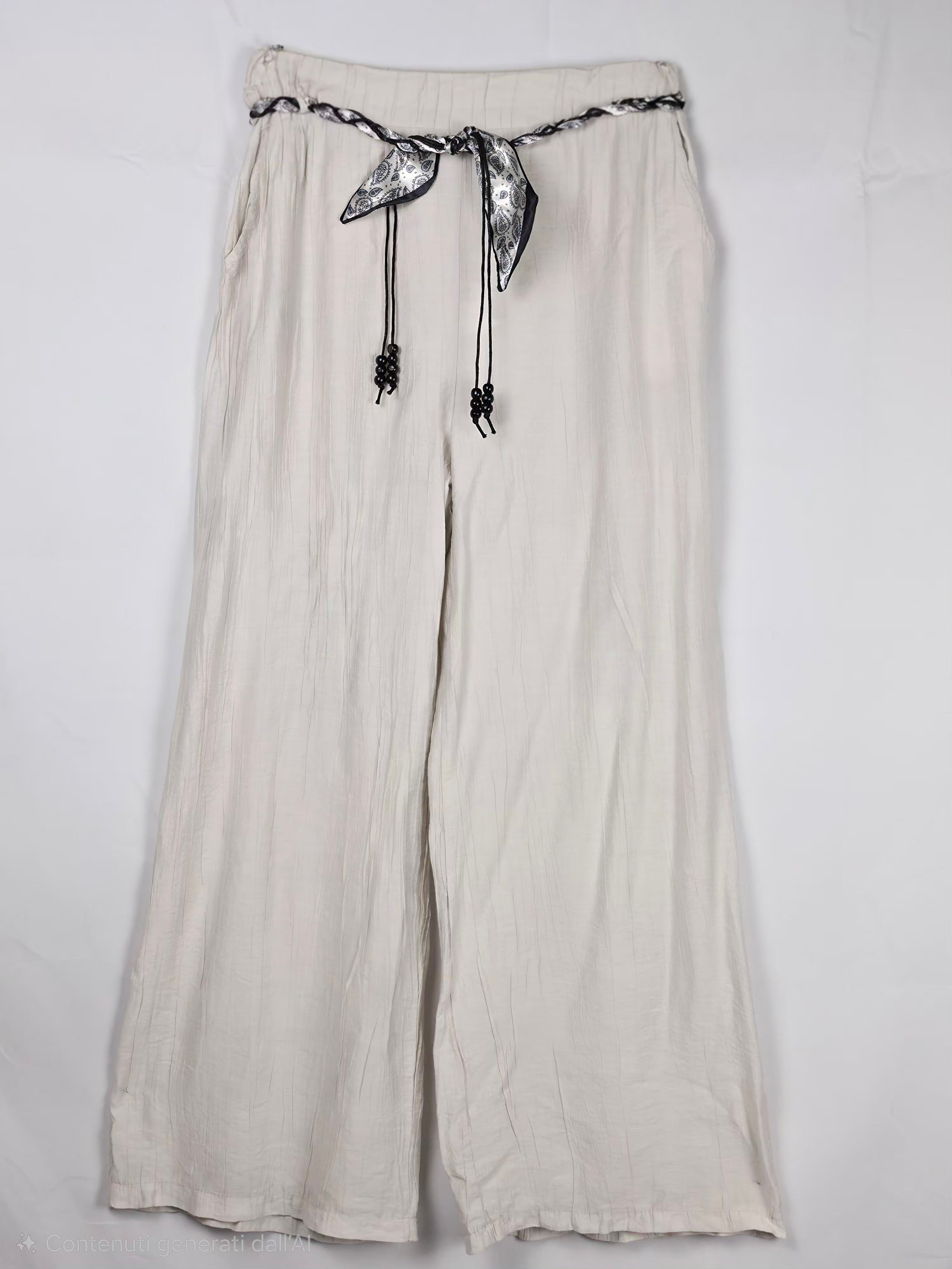 Completo in lino  con camicia annodata e pantaloni palazzo
