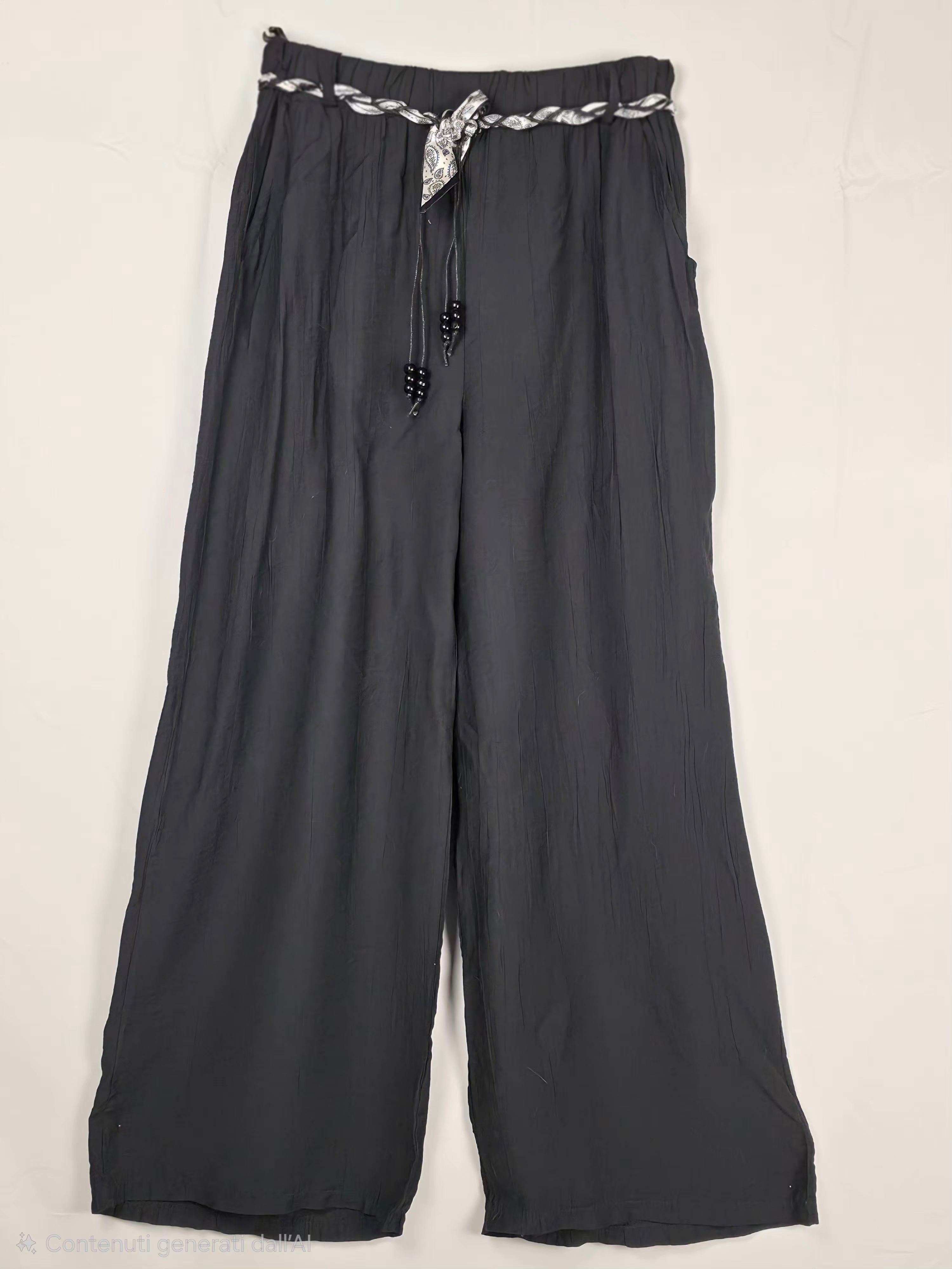 Completo in lino  con camicia annodata e pantaloni palazzo